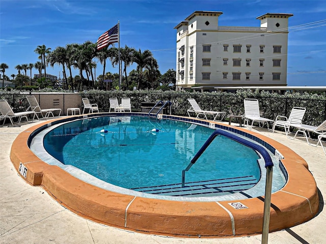 200 The Esplanade N Unit B19, Venice, FL 34285 - community pool featuring a patio area