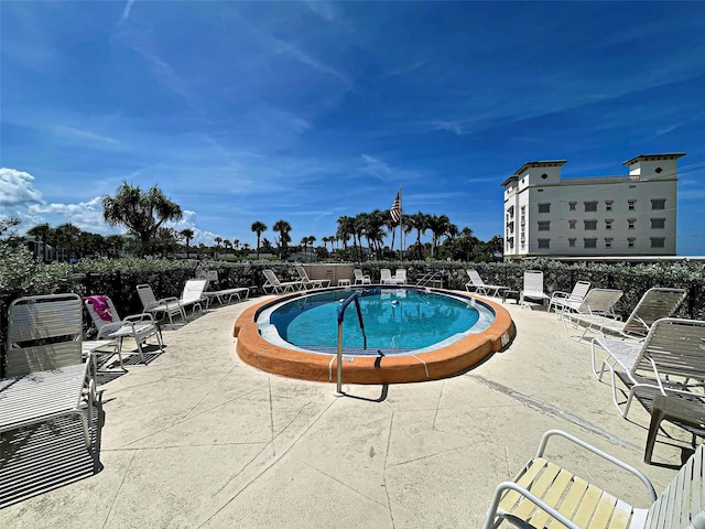 200 The Esplanade N Unit B19, Venice, FL 34285 - community pool with a patio area