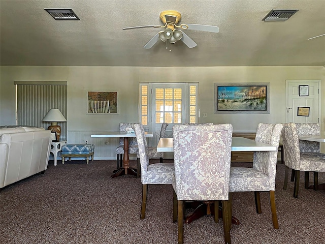 200 The Esplanade N Unit B19, Venice, FL 34285 - carpeted dining room featuring a ceiling fan and a textured ceiling