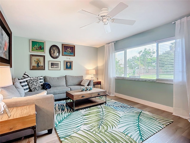 3274 Savage Rd, Sarasota, FL 34231 - living room featuring light wood finished floors and ceiling fan