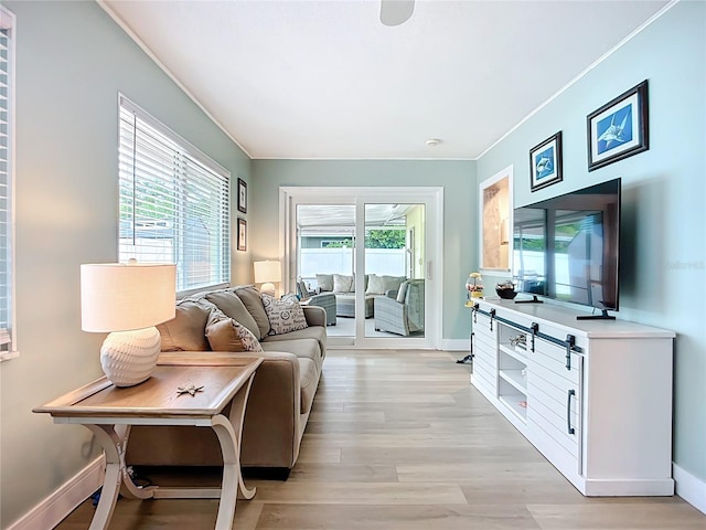 3274 Savage Rd, Sarasota, FL 34231 - living area with crown molding and light wood finished floors