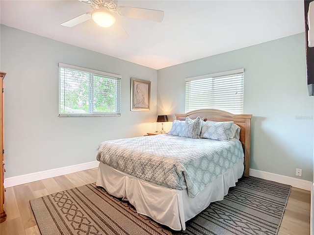3274 Savage Rd, Sarasota, FL 34231 - bedroom featuring light wood-style flooring and a ceiling fan
