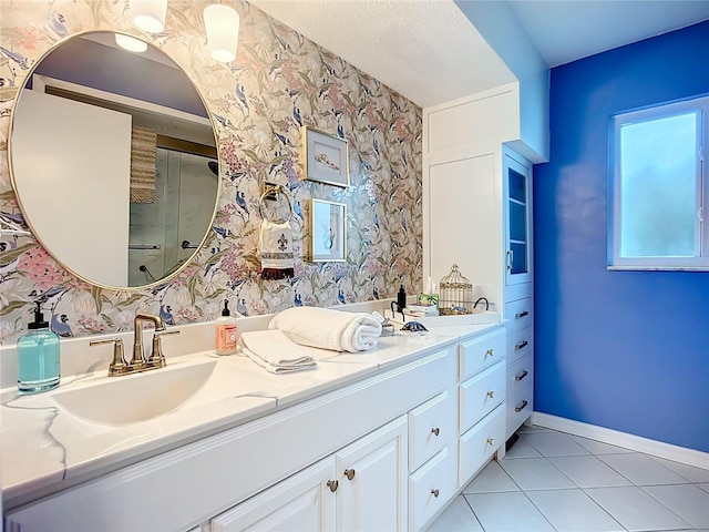 3274 Savage Rd, Sarasota, FL 34231 - bathroom featuring double vanity, tile patterned floors, and wallpapered walls