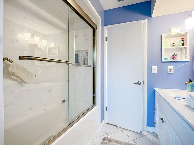 3274 Savage Rd, Sarasota, FL 34231 - bathroom with tile patterned floors, vanity, and combined bath / shower with glass door