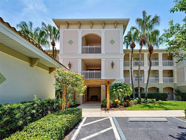 800 San Lino Cir Unit 813, Venice, FL 34292 - view of building exterior featuring uncovered parking