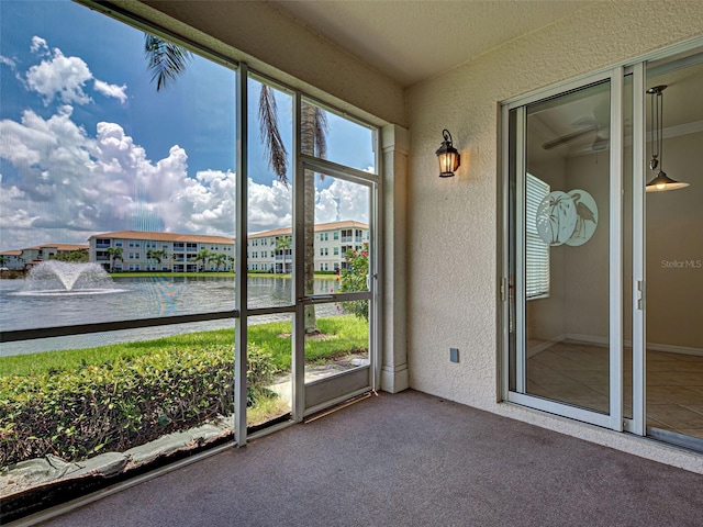 800 San Lino Cir Unit 813, Venice, FL 34292 - unfurnished sunroom featuring a water view