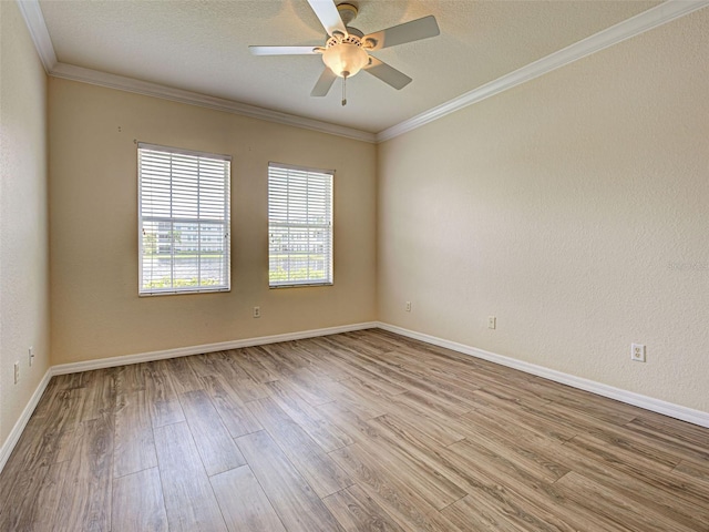800 San Lino Cir Unit 813, Venice, FL 34292 - spare room featuring wood finished floors, ornamental molding, ceiling fan, and a textured ceiling