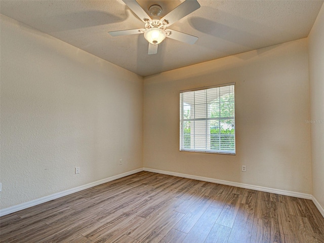 800 San Lino Cir Unit 813, Venice, FL 34292 - empty room with wood finished floors and a ceiling fan