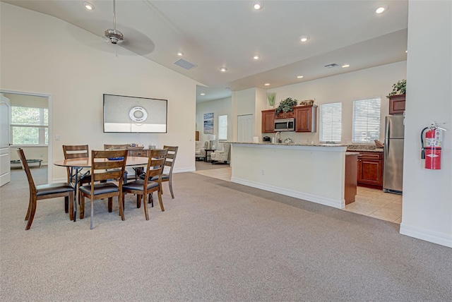 800 San Lino Cir Unit 813, Venice, FL 34292 - dining area with light carpet, ceiling fan, recessed lighting, baseboard heating, and vaulted ceiling