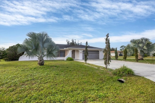 12001 Daroco Ln, North Port, FL 34287 - ranch-style home featuring concrete driveway, a garage, a front yard, and stucco siding