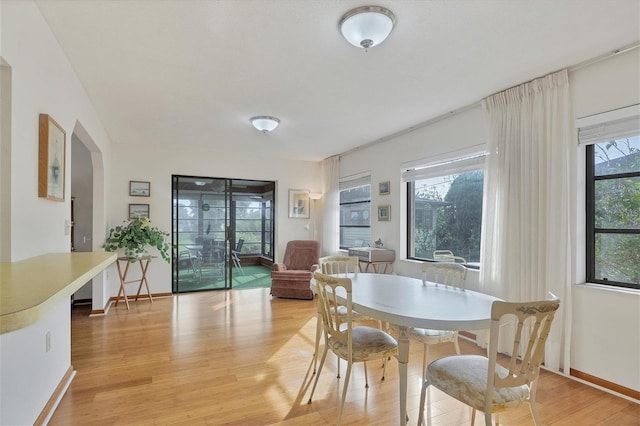 12001 Daroco Ln, North Port, FL 34287 - dining room with light wood finished floors and baseboards