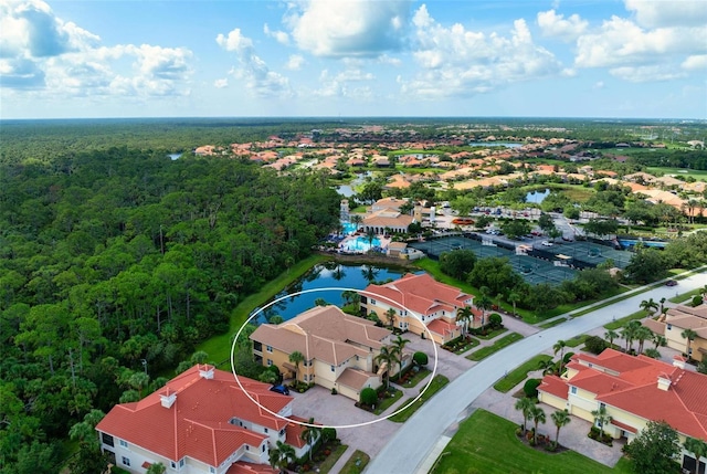 114 Bella Vista Ter Unit 6C, Nokomis, FL 34275 - aerial view of residential area featuring a nearby body of water and a heavily wooded area