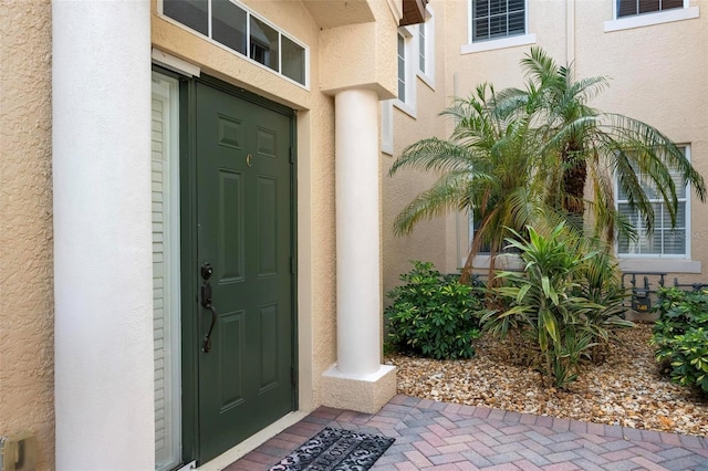 114 Bella Vista Ter Unit 6C, Nokomis, FL 34275 - property entrance with stucco siding
