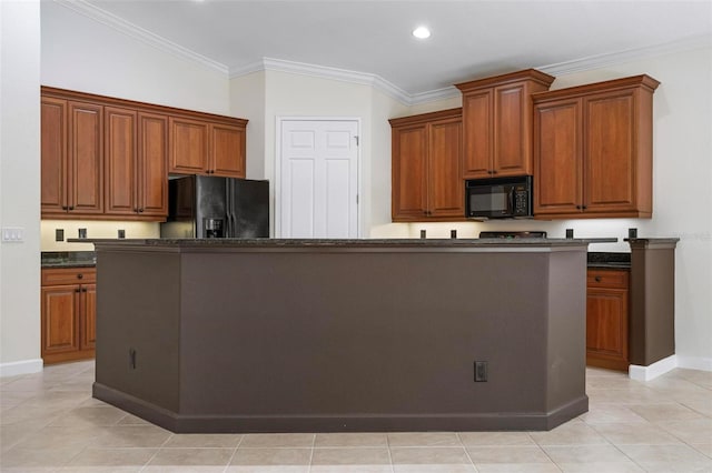 114 Bella Vista Ter Unit 6C, Nokomis, FL 34275 - kitchen featuring black appliances, crown molding, light tile patterned floors, brown cabinets, and recessed lighting