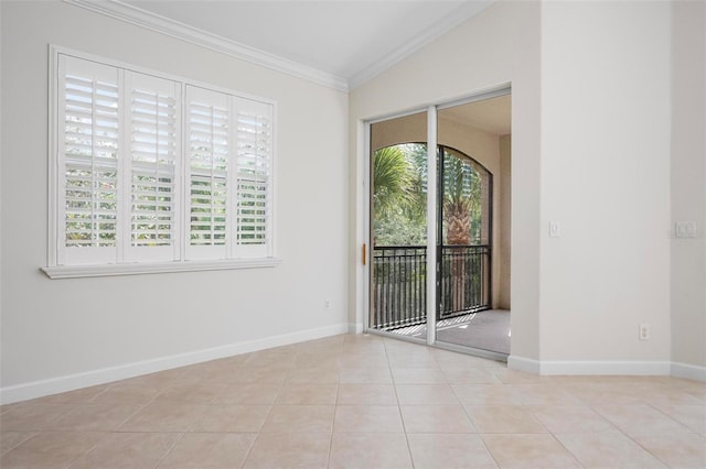 114 Bella Vista Ter Unit 6C, Nokomis, FL 34275 - spare room featuring crown molding, light tile patterned flooring, and lofted ceiling