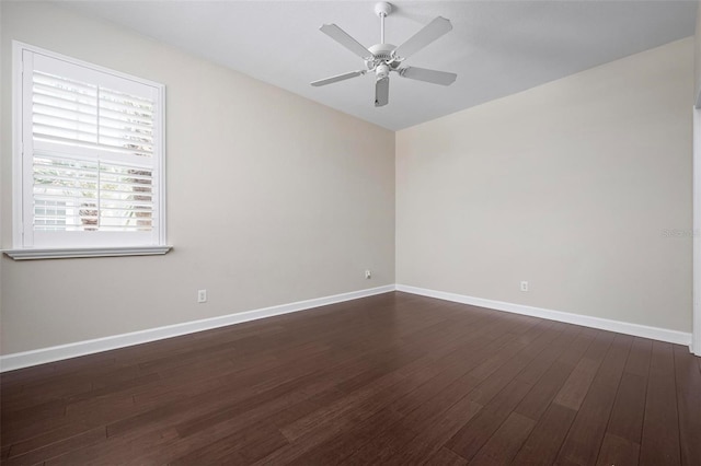 114 Bella Vista Ter Unit 6C, Nokomis, FL 34275 - empty room featuring dark wood-style flooring and ceiling fan