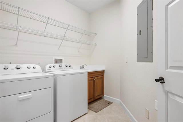 114 Bella Vista Ter Unit 6C, Nokomis, FL 34275 - washroom with independent washer and dryer, cabinet space, electric panel, and light tile patterned floors