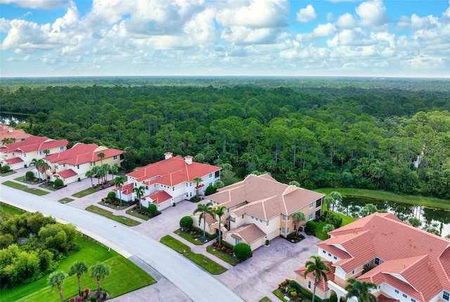 114 Bella Vista Ter Unit 6C, Nokomis, FL 34275 - bird's eye view of a heavily wooded area and a nearby body of water
