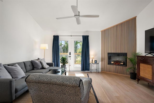 812 Garland Ave, Nokomis, FL 34275 - living area featuring wood finished floors, ceiling fan, and a fireplace
