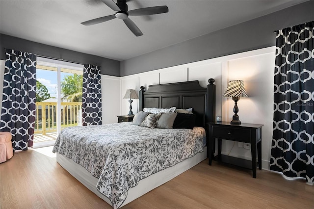 812 Garland Ave, Nokomis, FL 34275 - bedroom featuring access to outside, wood finished floors, and a ceiling fan