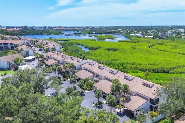1088 Bird Bay Way Unit 307, Venice, FL 34285 - aerial perspective of suburban area featuring a large body of water