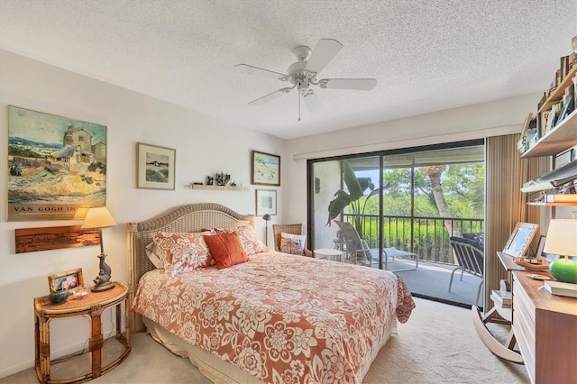 1088 Bird Bay Way Unit 307, Venice, FL 34285 - carpeted bedroom with access to exterior, a textured ceiling, and ceiling fan