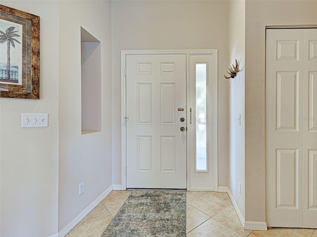 903 Addington Ct Unit 203, Venice, FL 34293 - foyer entrance featuring light tile patterned flooring