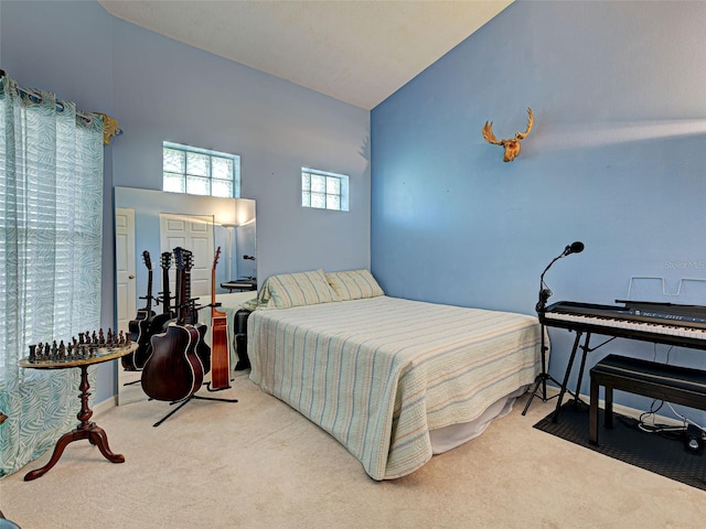 903 Addington Ct Unit 203, Venice, FL 34293 - carpeted bedroom featuring vaulted ceiling