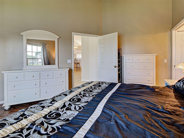 903 Addington Ct Unit 203, Venice, FL 34293 - bedroom with a towering ceiling and baseboards