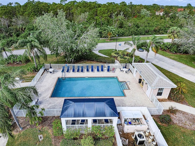 903 Addington Ct Unit 203, Venice, FL 34293 - community pool with a fenced backyard and a patio