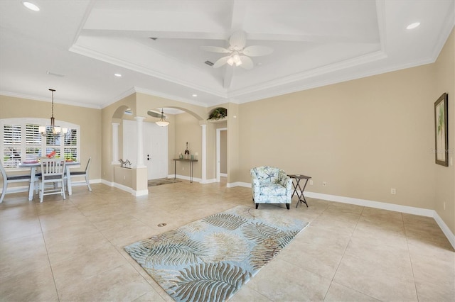 2471 Silver Palm Rd, North Port, FL 34288 - sitting room featuring arched walkways, a tray ceiling, ceiling fan, a chandelier, and light tile patterned floors