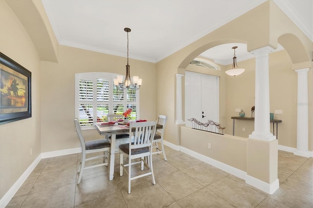 2471 Silver Palm Rd, North Port, FL 34288 - dining room featuring crown molding, arched walkways, ornate columns, light tile patterned floors, and a chandelier