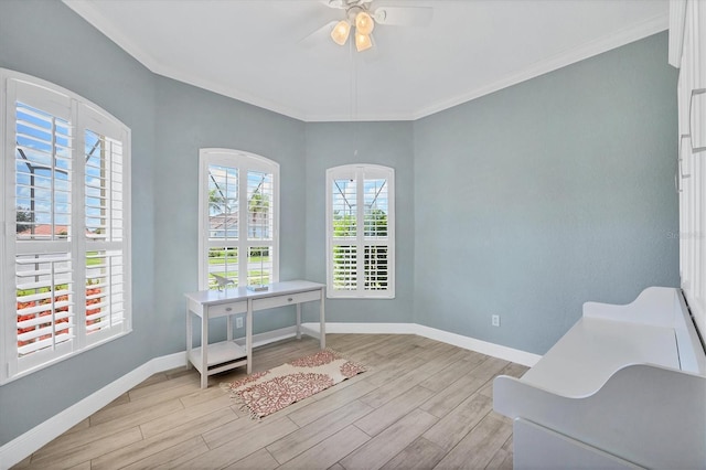 2471 Silver Palm Rd, North Port, FL 34288 - sitting room featuring healthy amount of natural light, wood finished floors, ornamental molding, and a ceiling fan