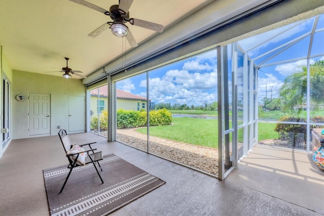 2471 Silver Palm Rd, North Port, FL 34288 - unfurnished sunroom with ceiling fan and a water view