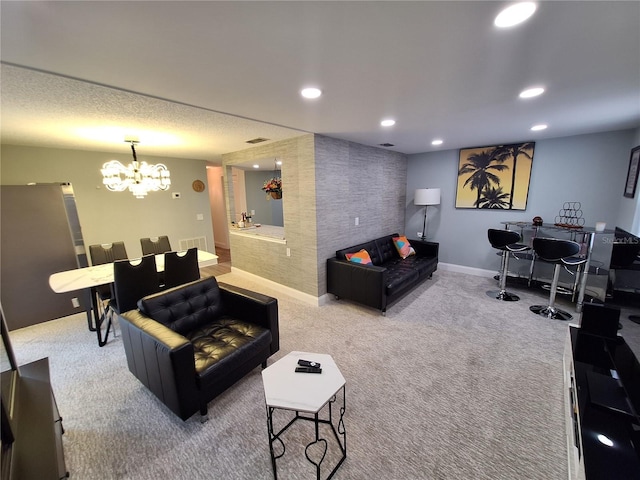 4022 Beaver Ln Unit 1000G, Port Charlotte, FL 33952 - carpeted living room with a chandelier and recessed lighting