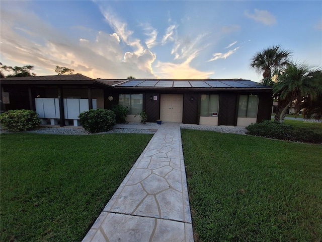 4022 Beaver Ln Unit 1000G, Port Charlotte, FL 33952 - ranch-style house featuring a front yard and solar panels