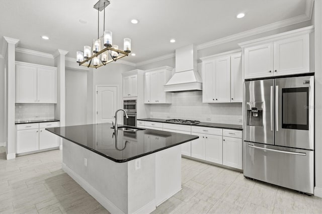 12301 Auburndale Ct, Venice, FL 34293 - kitchen with stainless steel appliances, premium range hood, dark countertops, tasteful backsplash, and white cabinetry