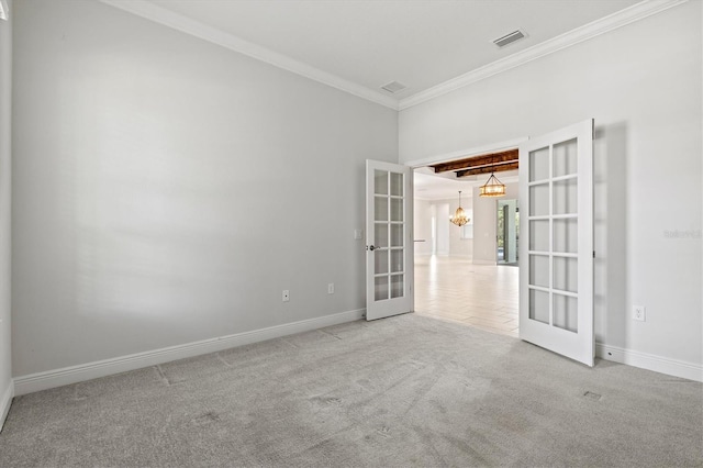 12301 Auburndale Ct, Venice, FL 34293 - spare room featuring french doors, ornamental molding, carpet floors, and a chandelier