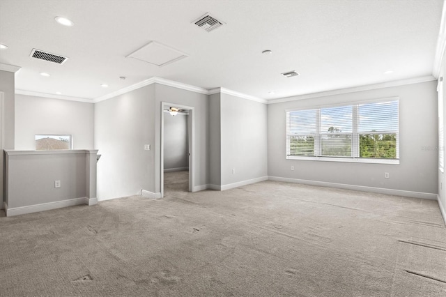 12301 Auburndale Ct, Venice, FL 34293 - spare room featuring ornamental molding, carpet flooring, recessed lighting, and attic access