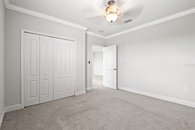 12301 Auburndale Ct, Venice, FL 34293 - unfurnished bedroom with crown molding, carpet flooring, a closet, and a ceiling fan