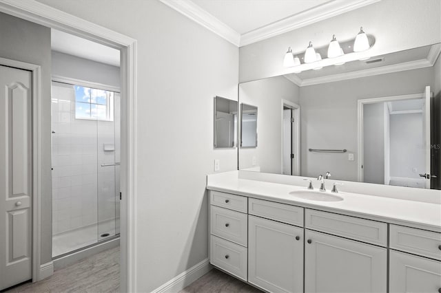 12301 Auburndale Ct, Venice, FL 34293 - bathroom with a shower stall, vanity, wood finished floors, and ornamental molding