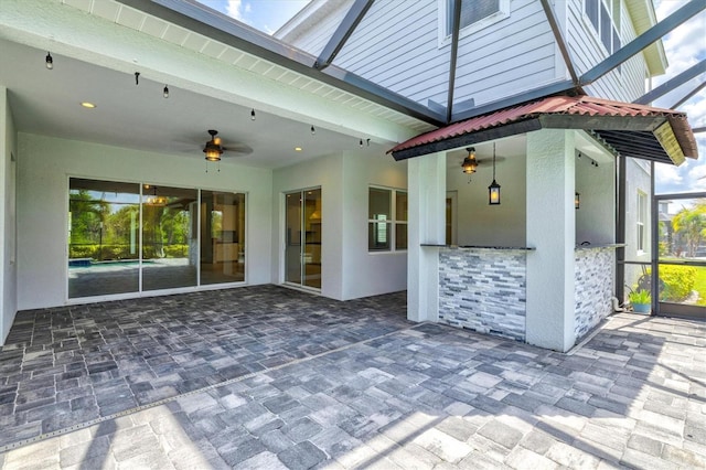 12301 Auburndale Ct, Venice, FL 34293 - view of patio featuring ceiling fan and glass enclosure
