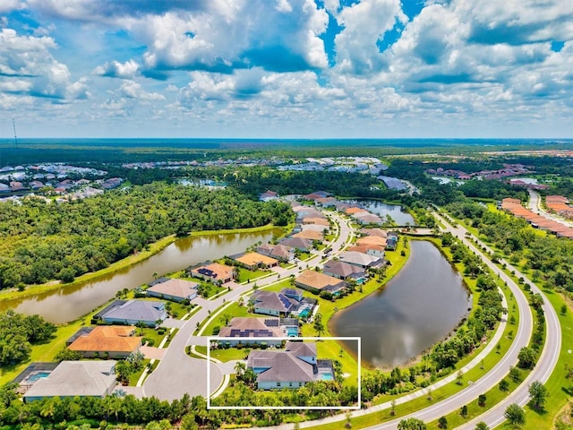 12301 Auburndale Ct, Venice, FL 34293 - aerial perspective of suburban area featuring a large body of water and property boundaries highlighted