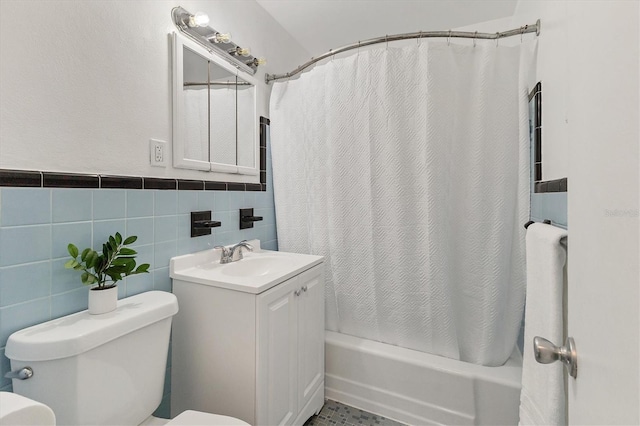 210 Duxbury Ave, Port Charlotte, FL 33952 - full bath featuring shower / bath combo with shower curtain, vanity, and tile walls