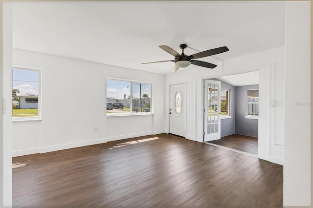 210 Duxbury Ave, Port Charlotte, FL 33952 - unfurnished room featuring plenty of natural light, dark wood-style floors, and ceiling fan