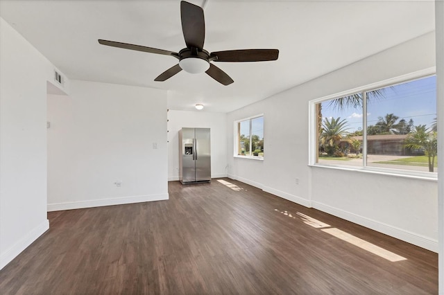 210 Duxbury Ave, Port Charlotte, FL 33952 - empty room featuring dark wood-style flooring and ceiling fan