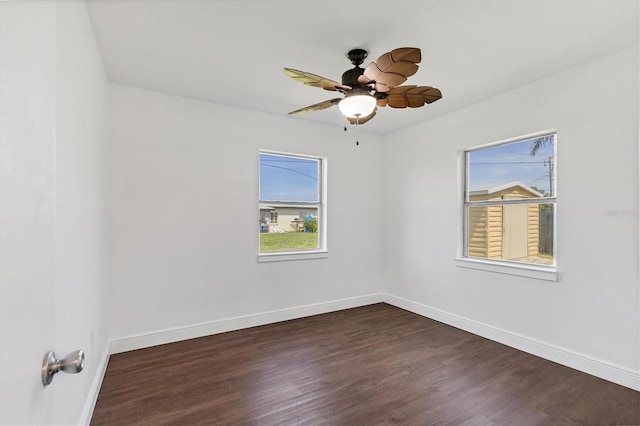 210 Duxbury Ave, Port Charlotte, FL 33952 - spare room featuring plenty of natural light, dark wood-style floors, and a ceiling fan