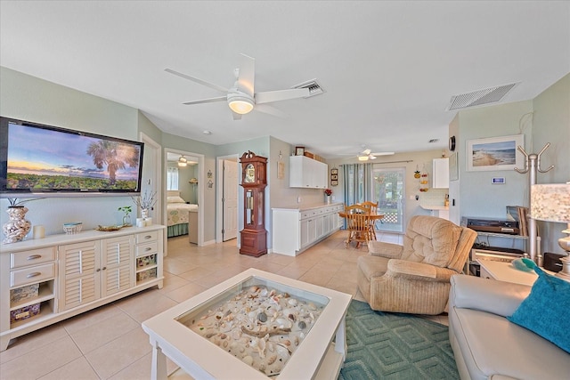 10341 Greenway Ave, Englewood, FL 34224 - living room with a ceiling fan and light tile patterned floors