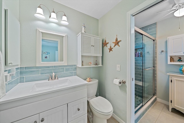 10341 Greenway Ave, Englewood, FL 34224 - full bathroom featuring vanity, a shower stall, tile patterned floors, and ceiling fan