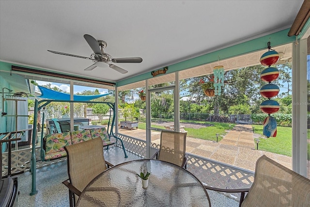 10341 Greenway Ave, Englewood, FL 34224 - sunroom featuring outdoor dining area and ceiling fan